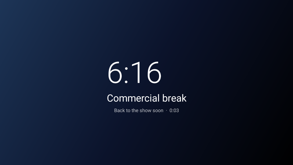 A TV showing the Not in Front of the Kids cover: a large clock, the words 'Commercial break', and a timer.